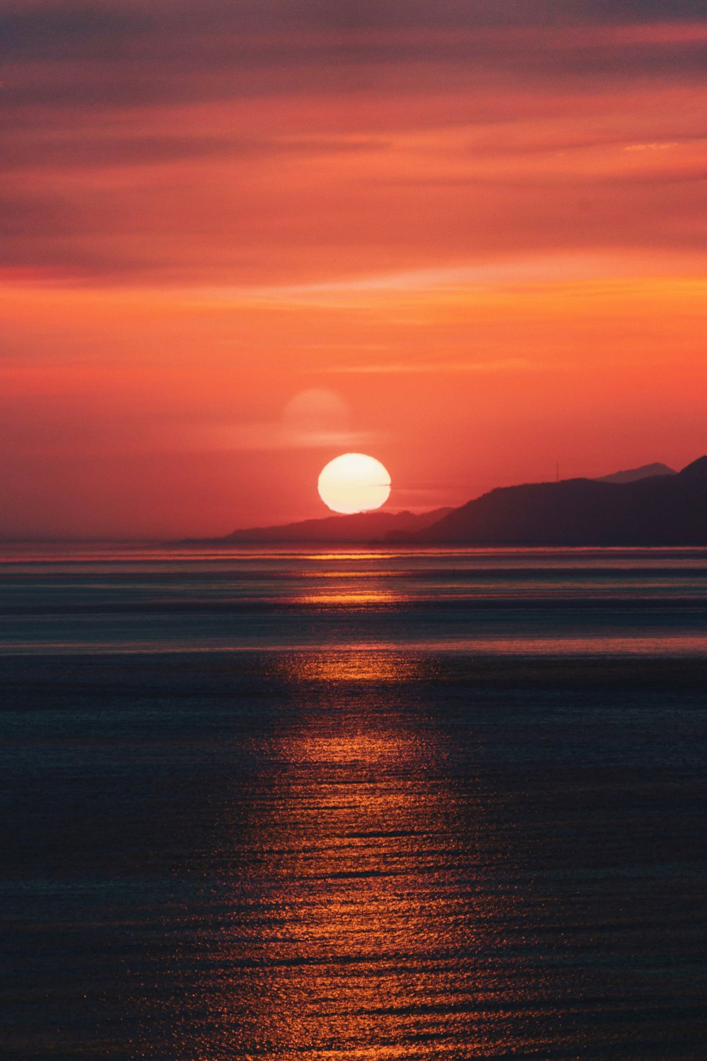 silhouette of mountain during sunset