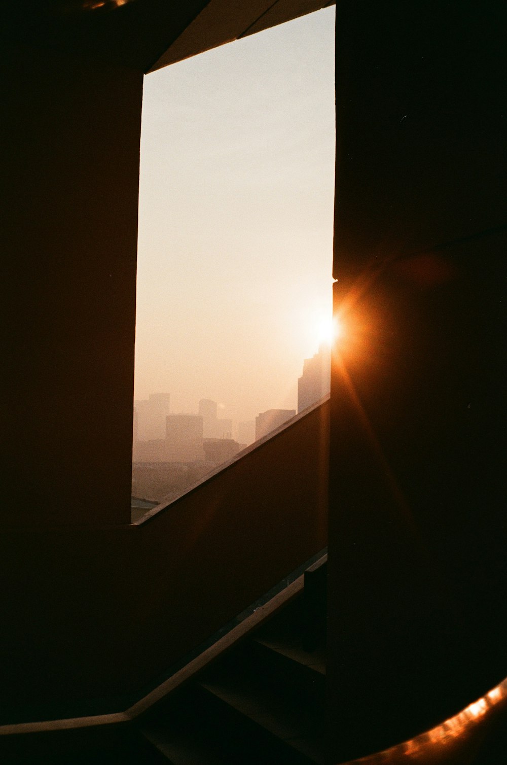 silhouette of building during sunset