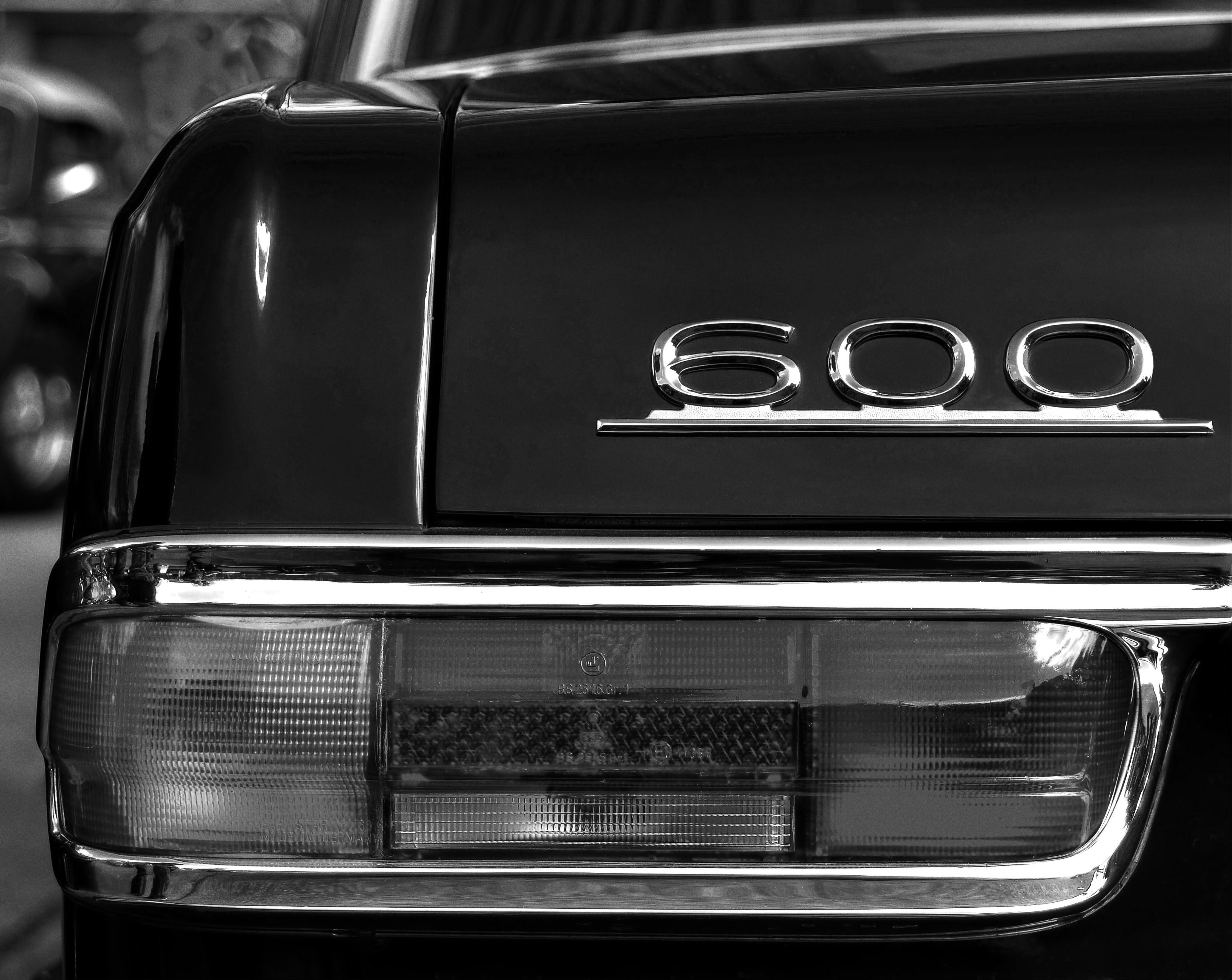 black mercedes benz car in grayscale photography