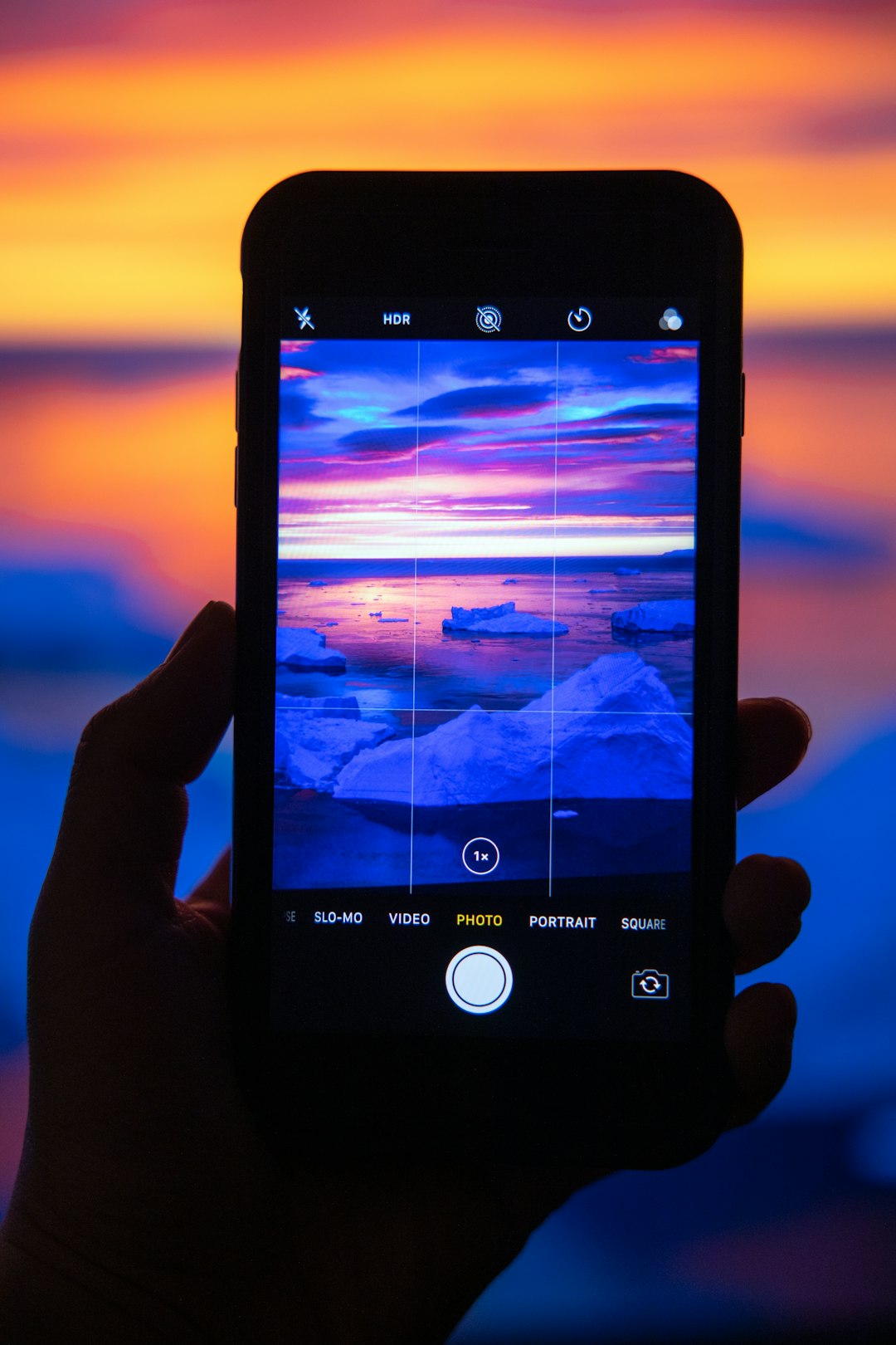 person holding black iphone 4