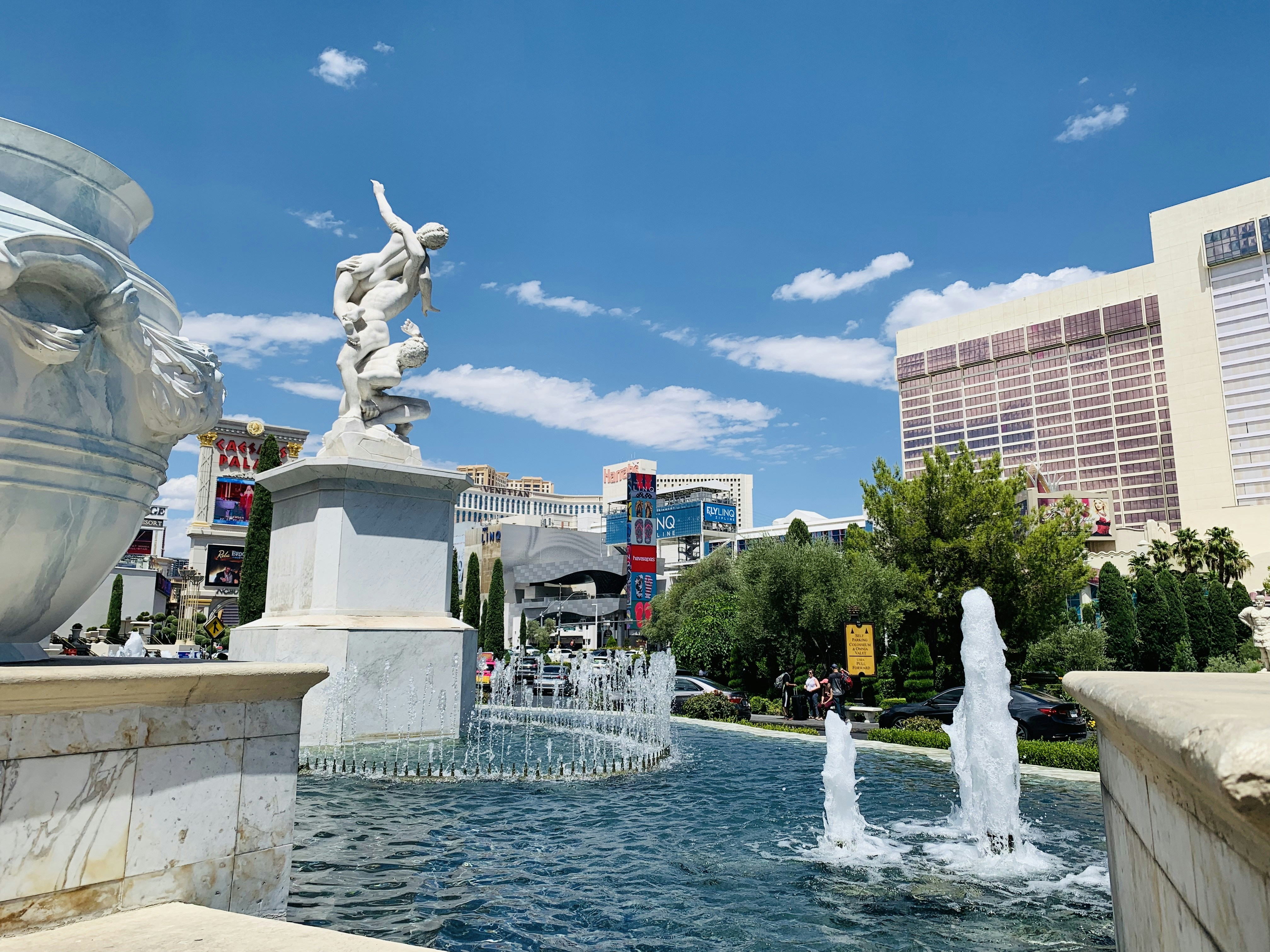 fountain in front of brown building during daytime, Caesar’s Palace Las Vegas