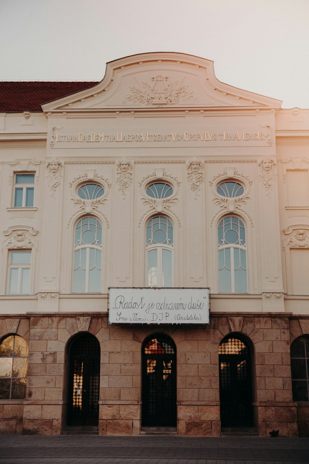 a building with a sign on the front of it