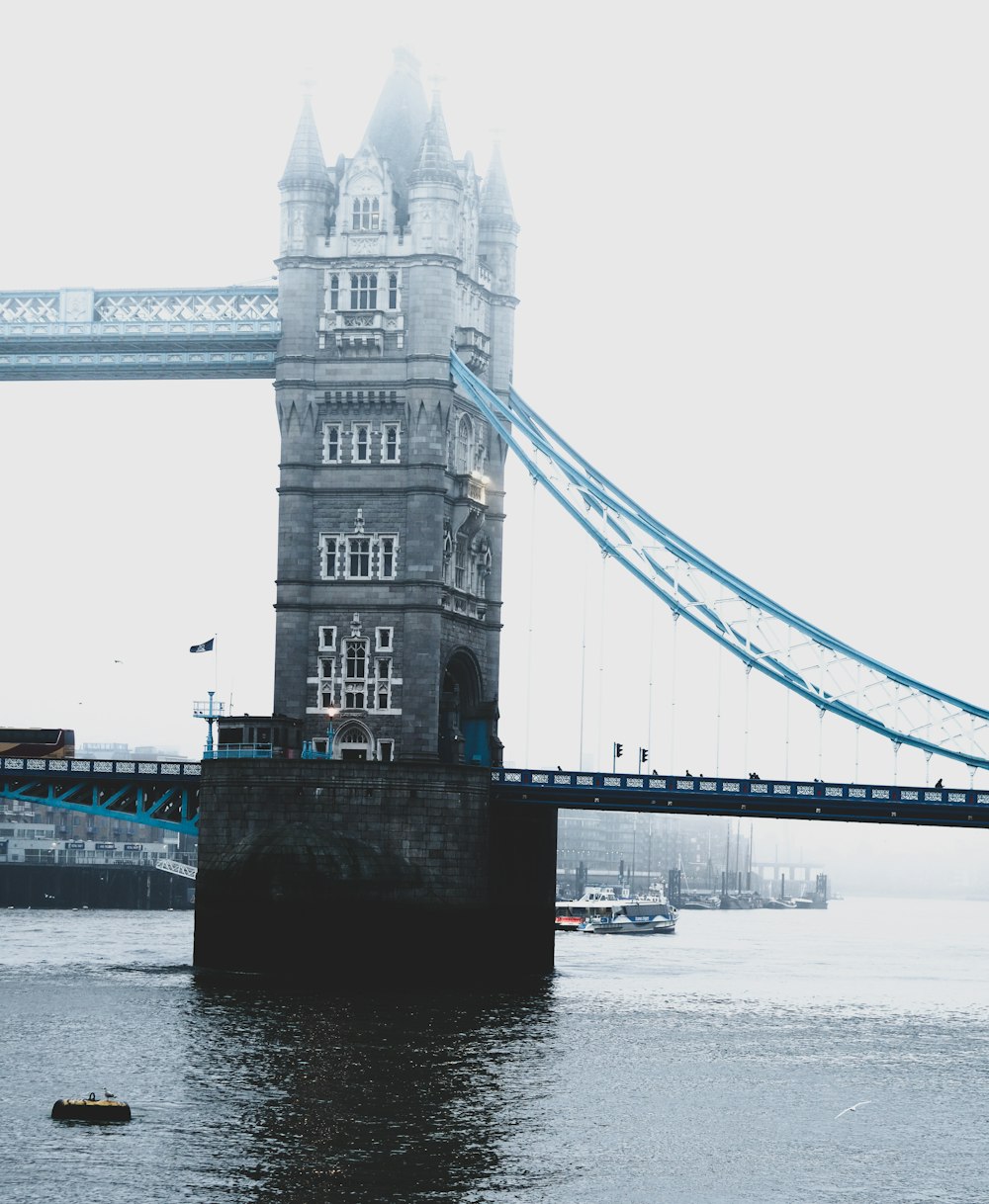 london bridge under white sky during daytime