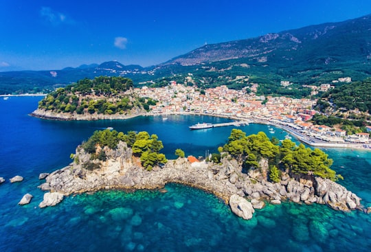 aerial view of green trees and blue sea during daytime in Parga Greece