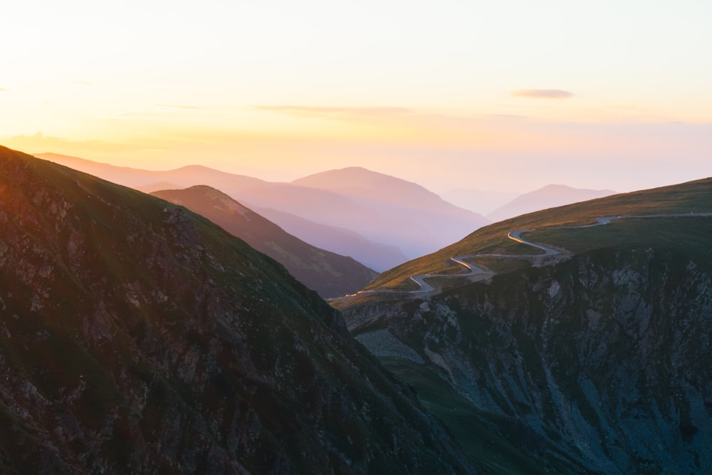 green and brown mountains under blue sky during daytime