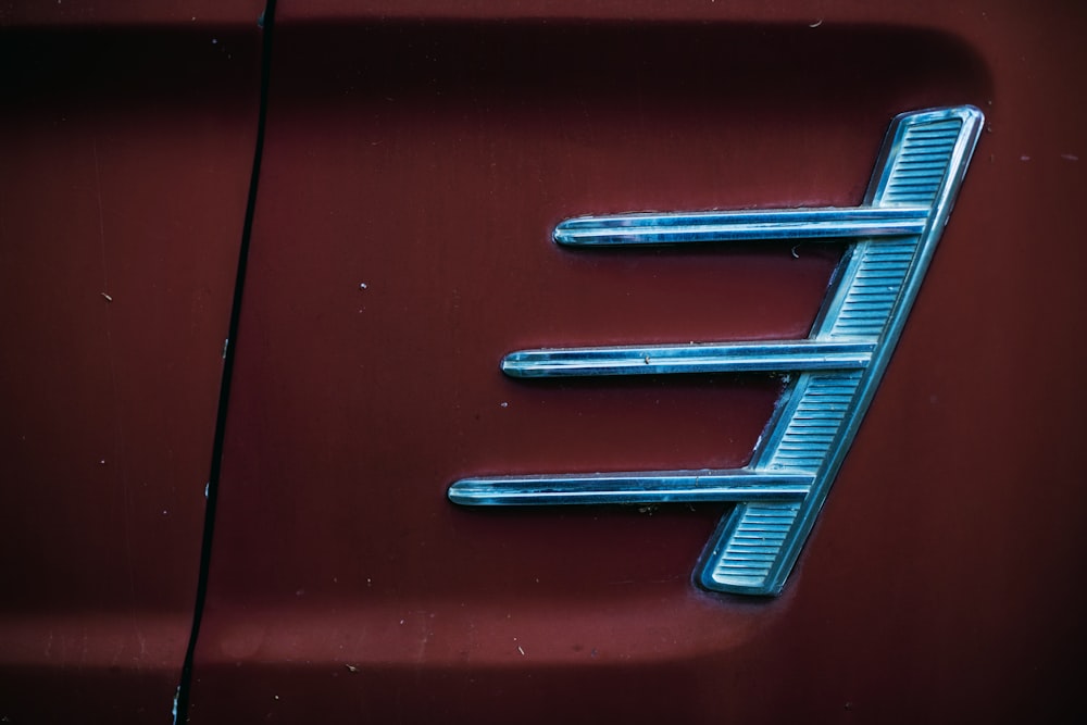 red car with silver grille