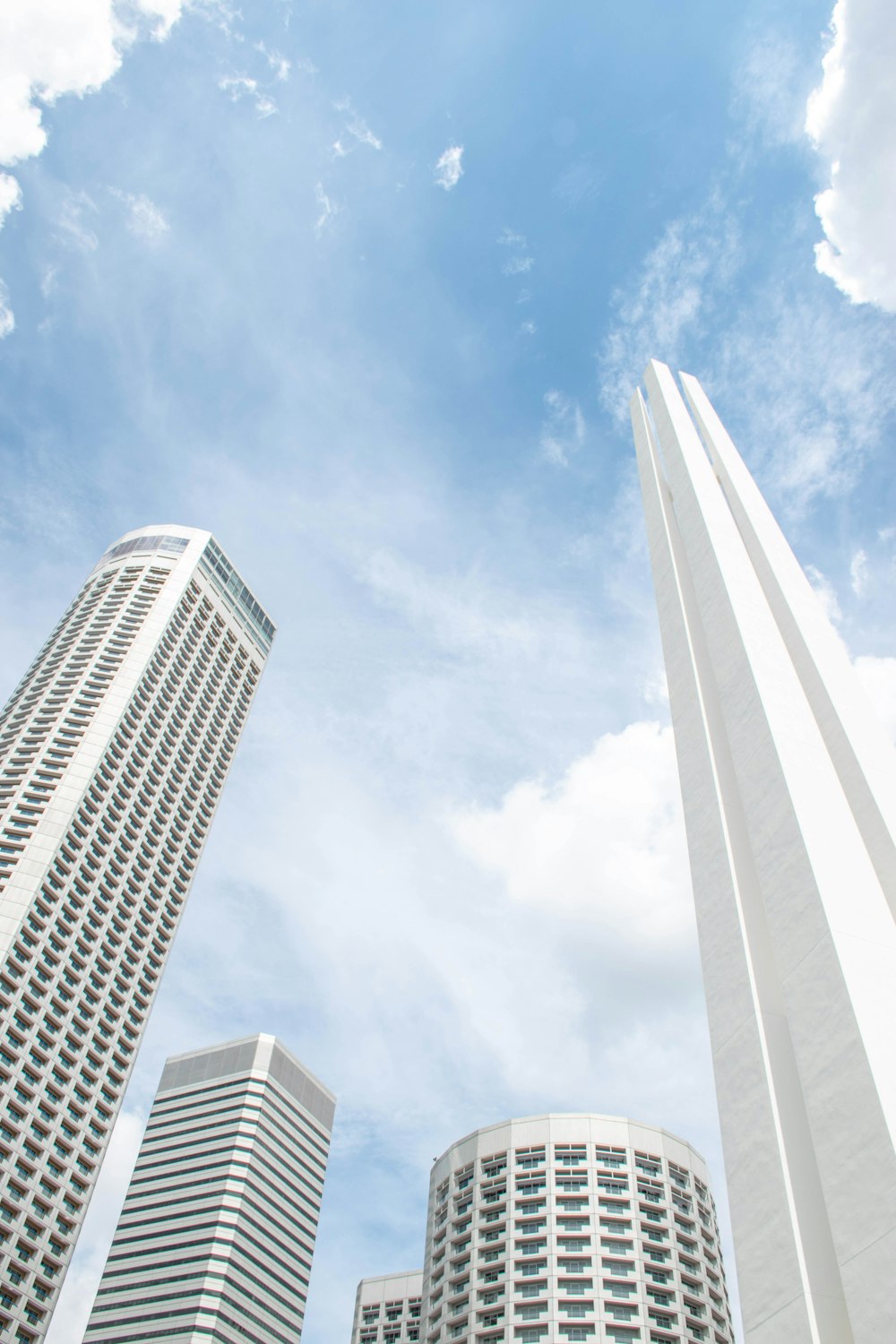 white concrete building under blue sky during daytime