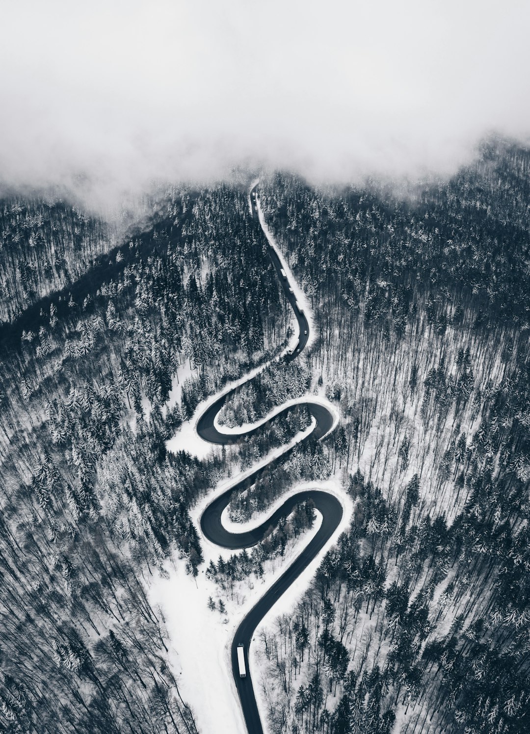 grayscale photo of mountain ranges