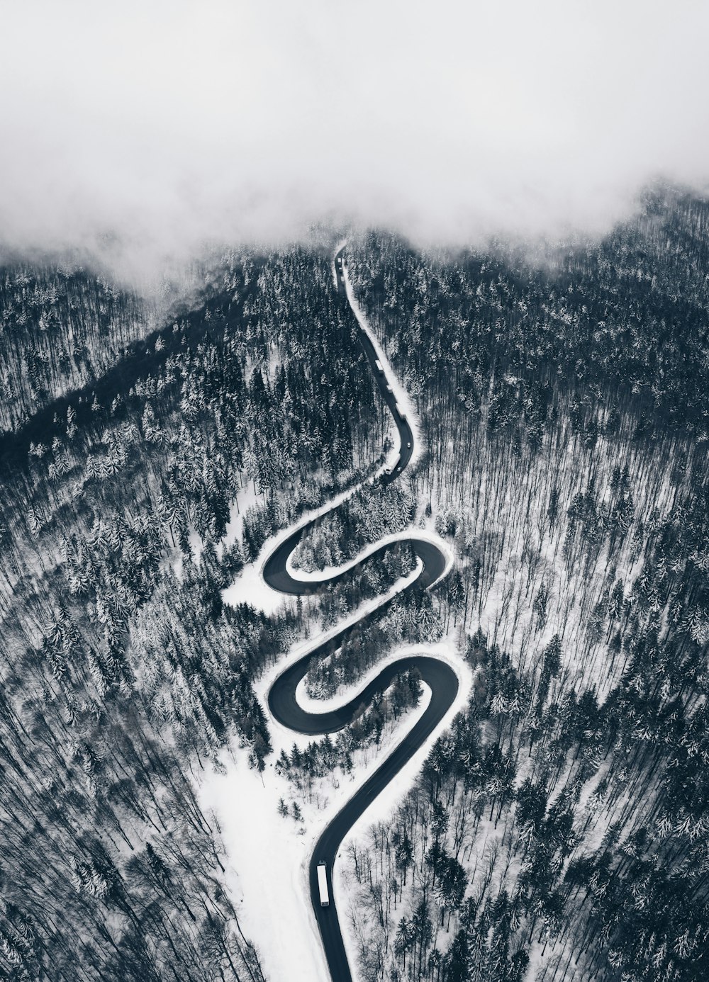 grayscale photo of mountain ranges