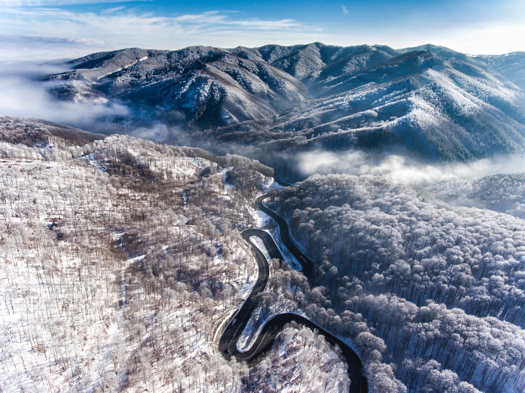 aerial view of gray and brown mountains during daytime