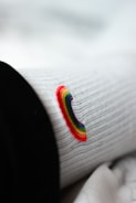 Modern t-shirt showcasing subtle rainbow-colored sublimated patterns on black fabric