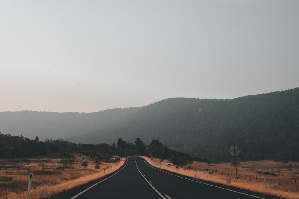 black asphalt road during daytime