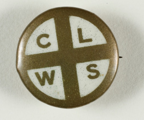 A round pin with a gold and white color scheme features the letters C, L, W, S in separate white quadrants divided by a gold cross. The letters are evenly spaced and bold in appearance.