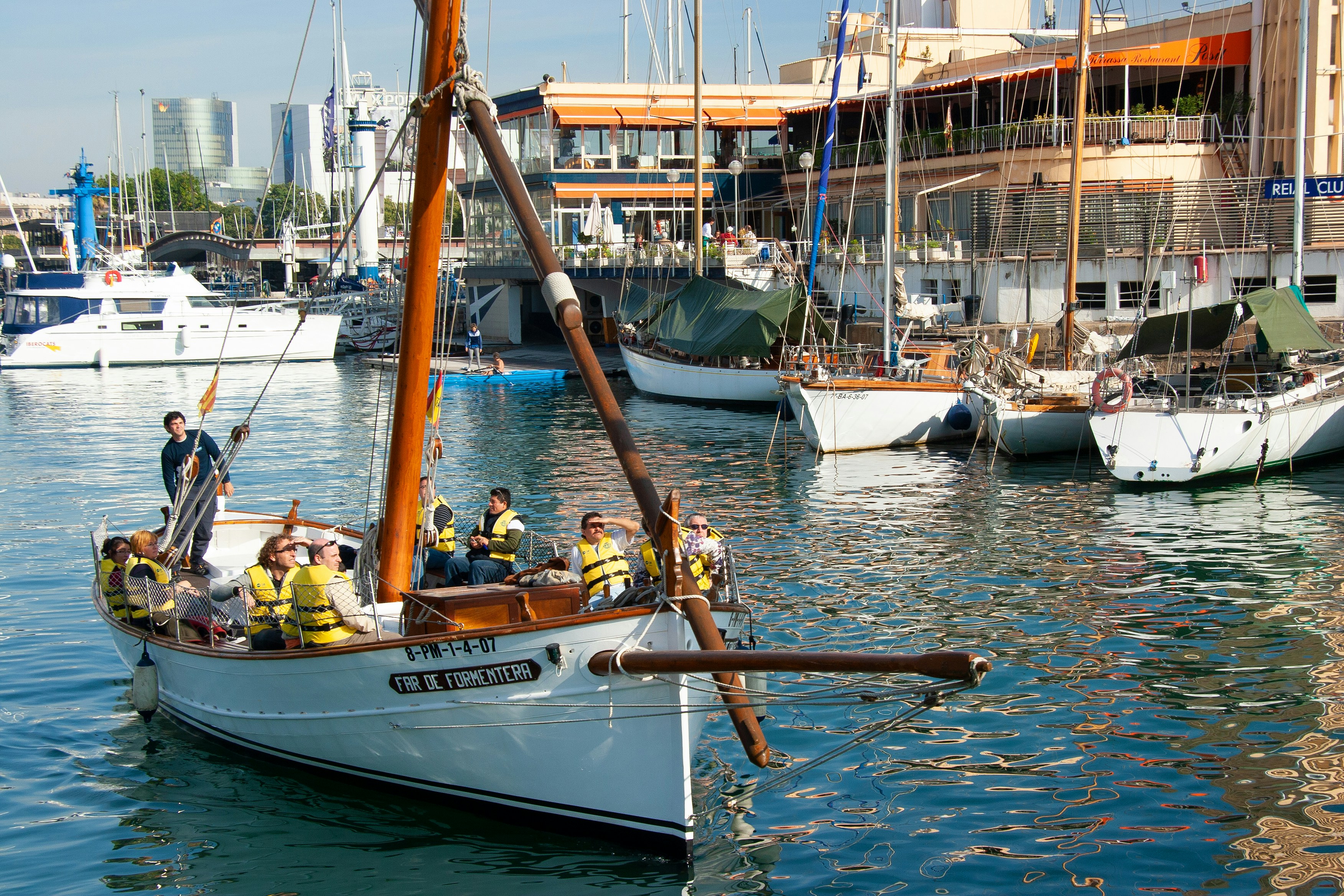 people riding on boat during daytime