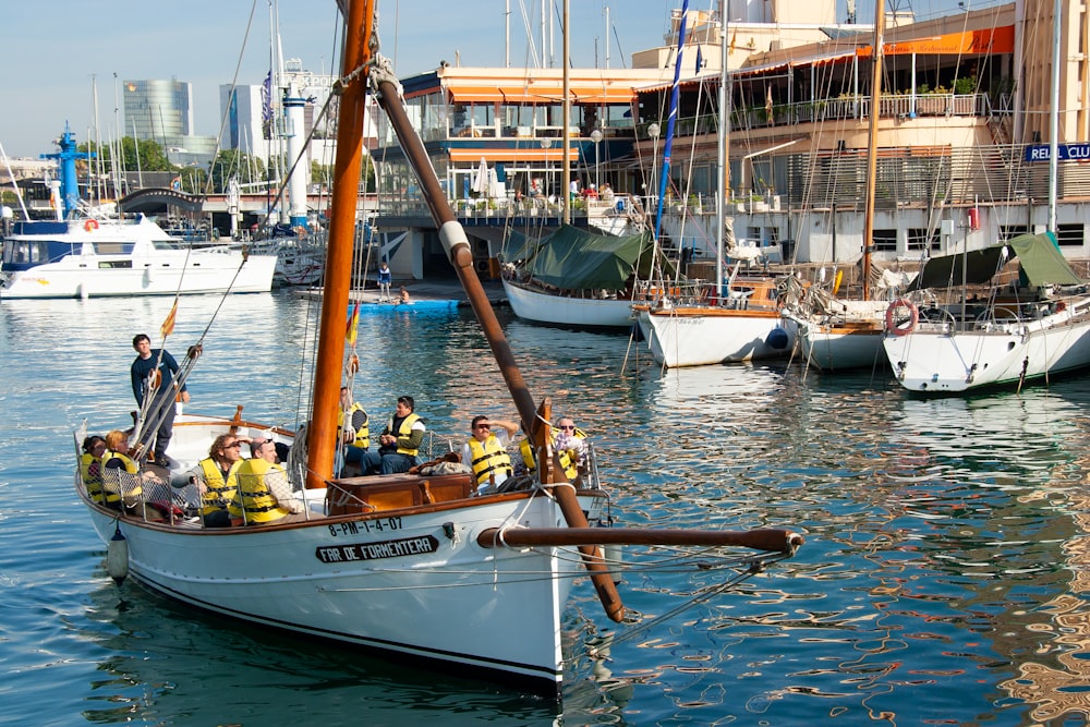 people riding on boat during daytime