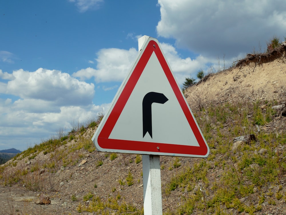 white and black arrow sign