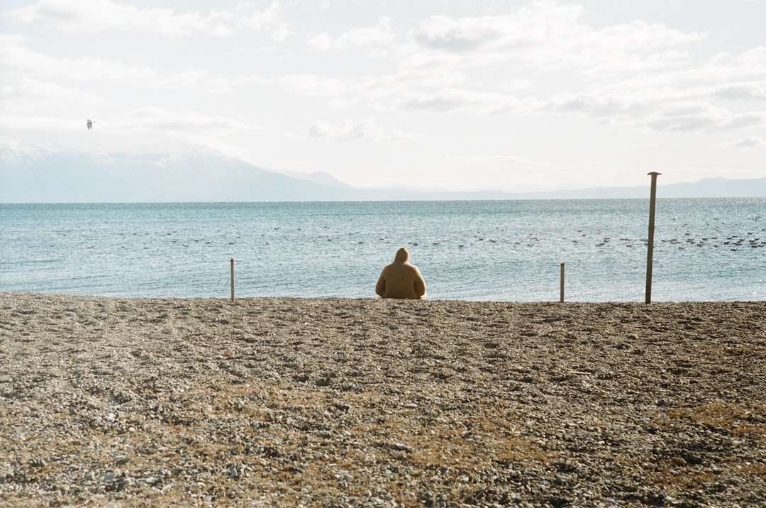 Man sitting on the beach in Struga