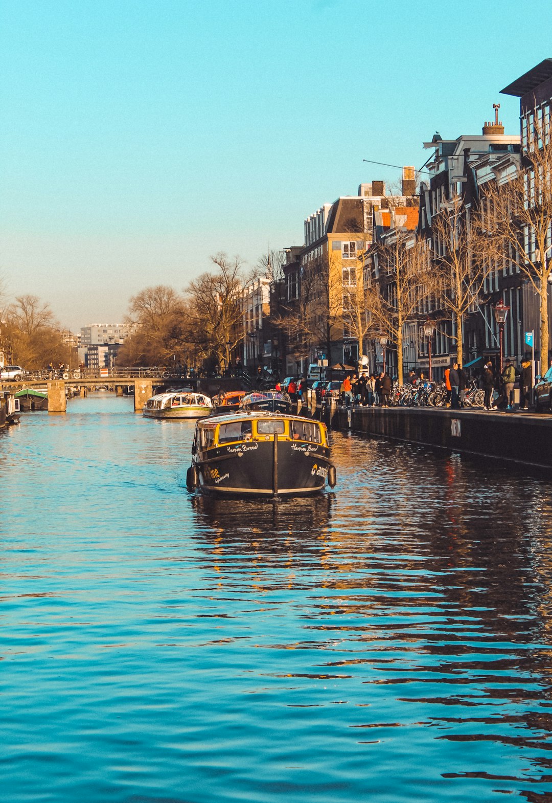 boat on river near buildings during daytime