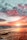 body of water under cloudy sky during sunset
