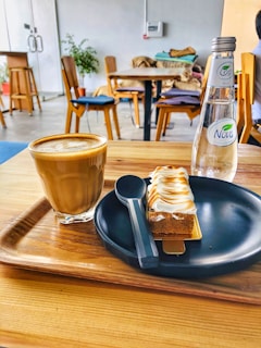 A beautifully set table in the café, featuring fresh local treats and handcrafted beverages