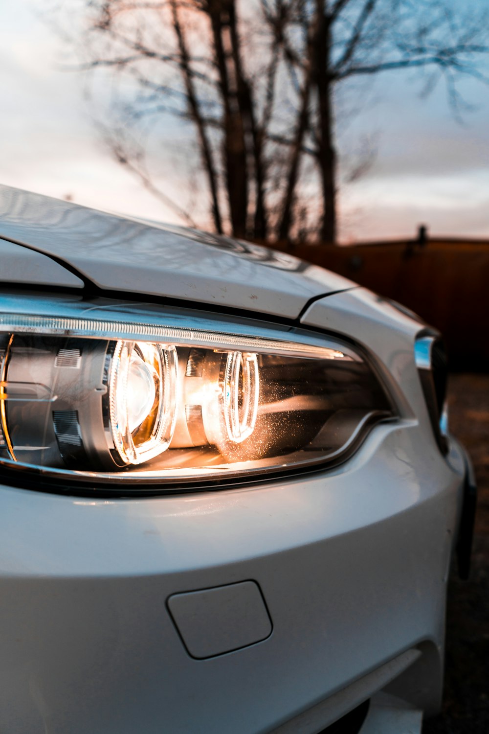 silver car with white light