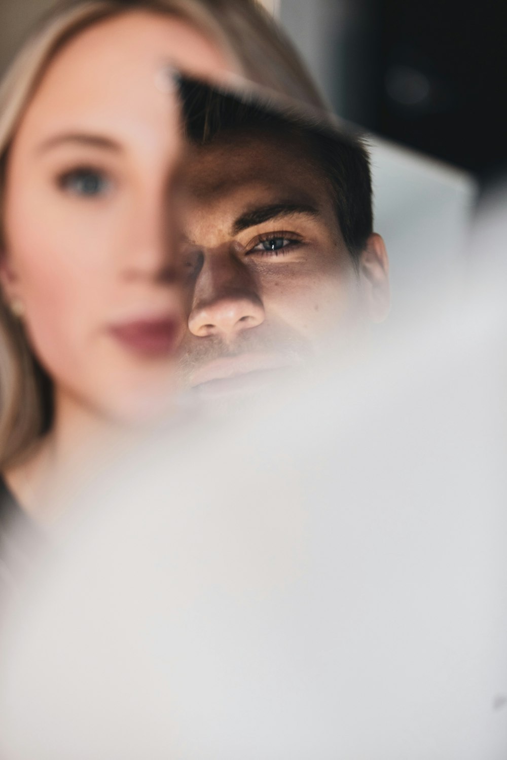 man and woman in white shirt