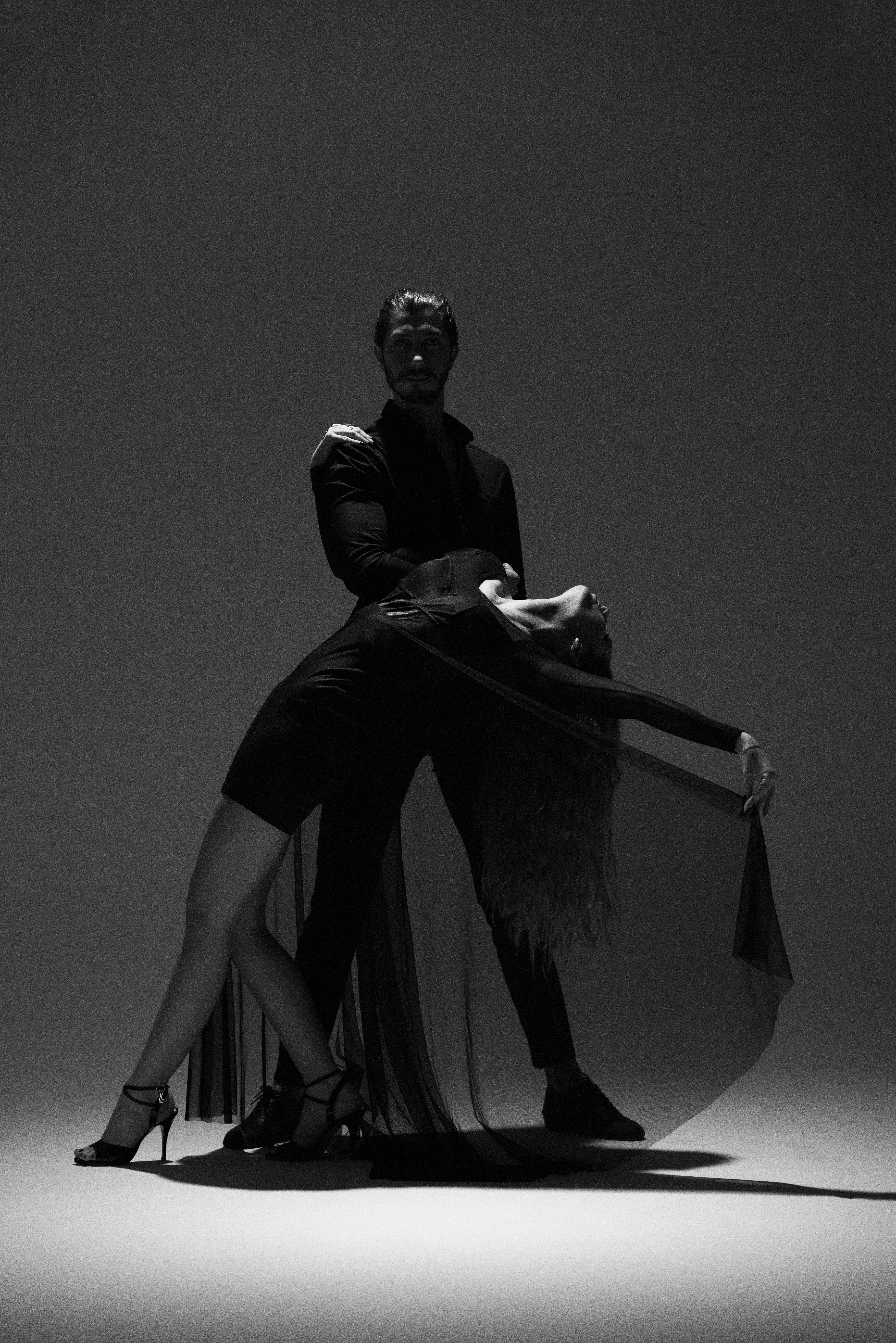 man in black suit jacket and pants