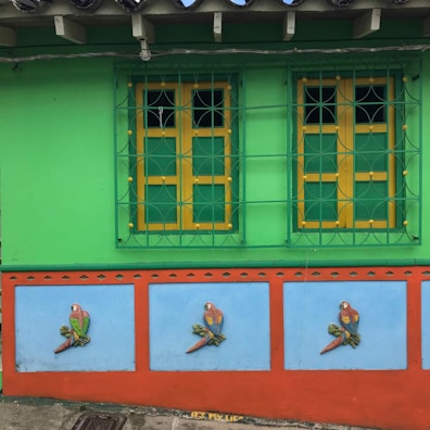 A before-and-after comparison showing a dull wall transformed into a lively, colorful space.