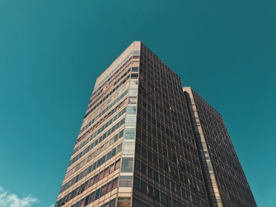gray concrete building under blue sky during daytime