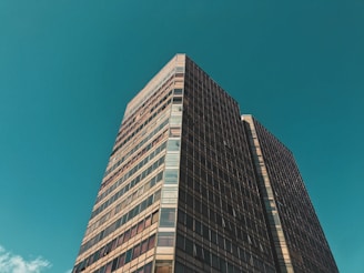 gray concrete building under blue sky during daytime