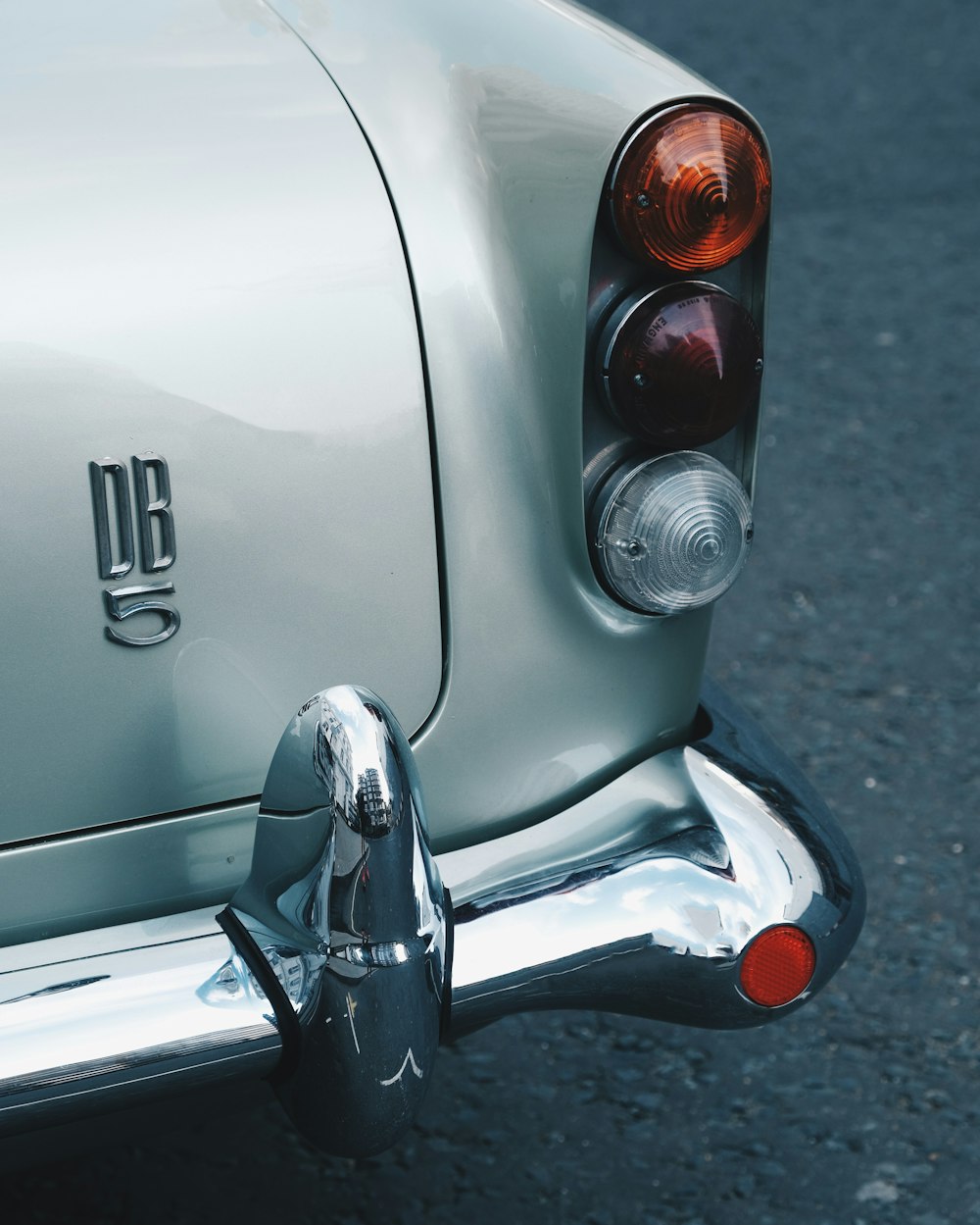 silver car with silver license plate