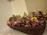 Close-up of a handwoven basket filled with colorful dried flowers.