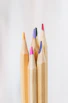 brown wooden pencil on white surface