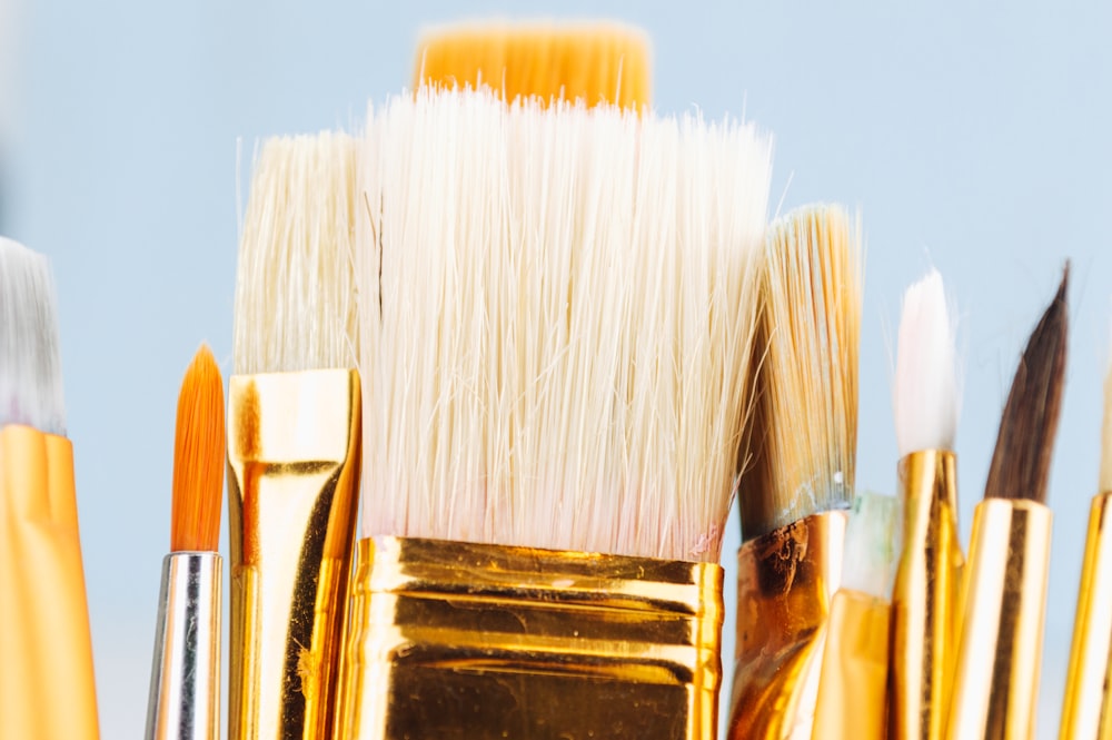 brown and silver makeup brushes