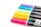 A collection of six vibrant, colorful markers arranged in a row, with caps facing the viewer. The markers feature a variety of colors including pink, orange, yellow, green, blue, and purple, and are set against a clean white background. Each marker has a black body with white text and logos indicating its water and weather resistance properties.