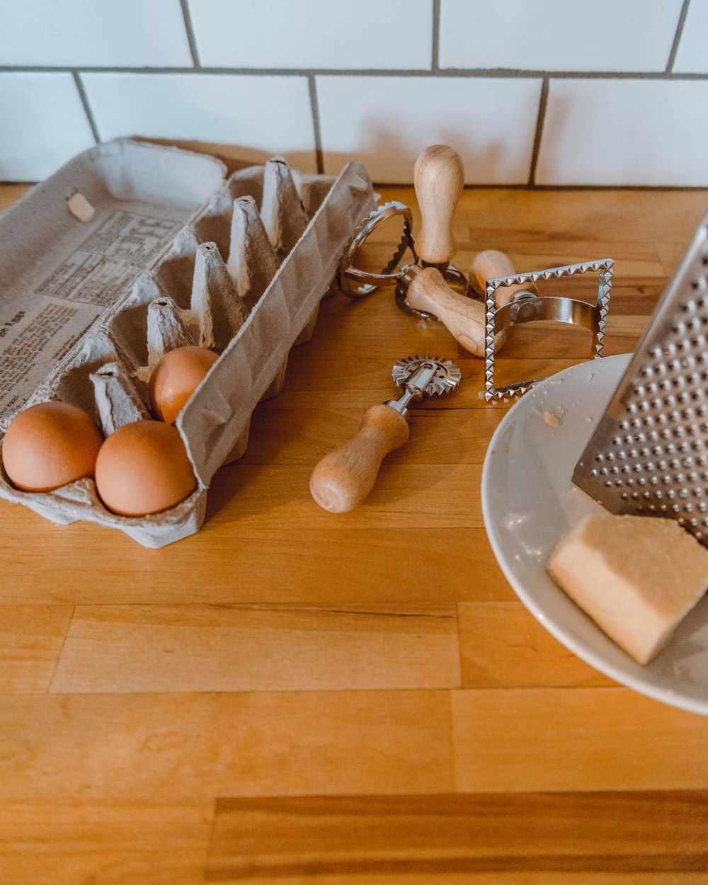 brown eggs on white ceramic plate