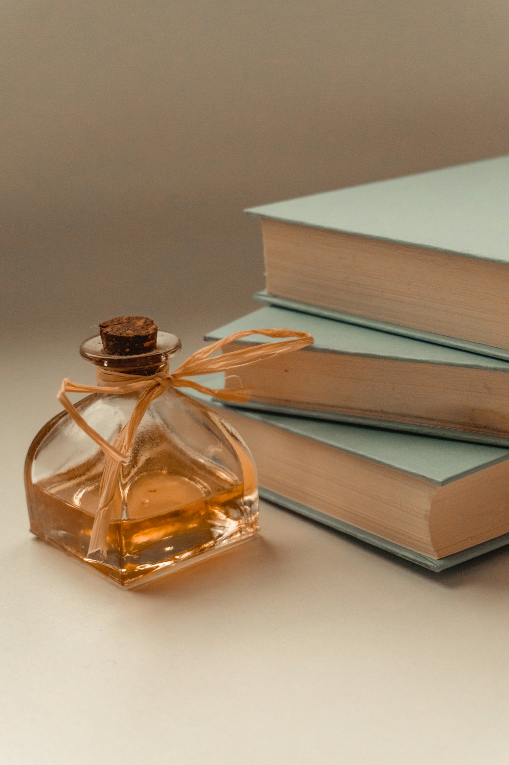 stack of books on white table