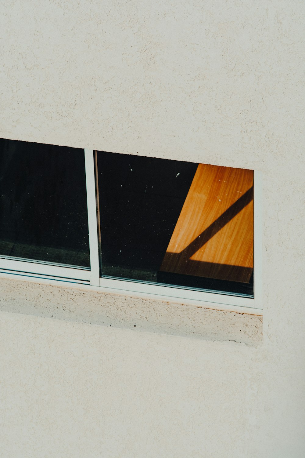 white wooden framed glass window