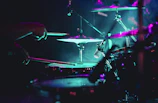 man playing drum set on stage