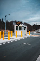 A friendly staff member welcoming visitors at UFO Recreation Holdings' entrance.