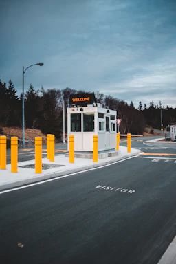A friendly staff member welcoming visitors at UFO Recreation Holdings' entrance.