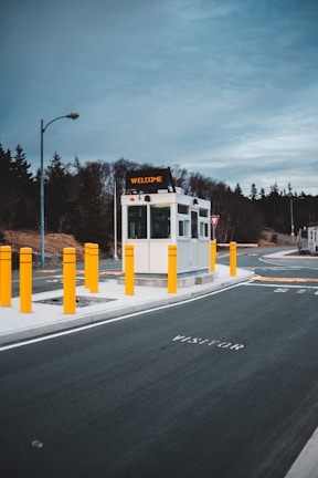 Secure school entrance with friendly staff welcoming visitors.