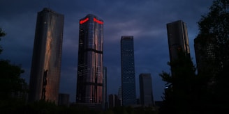 Cityscape at dusk symbolizing growth and progress.