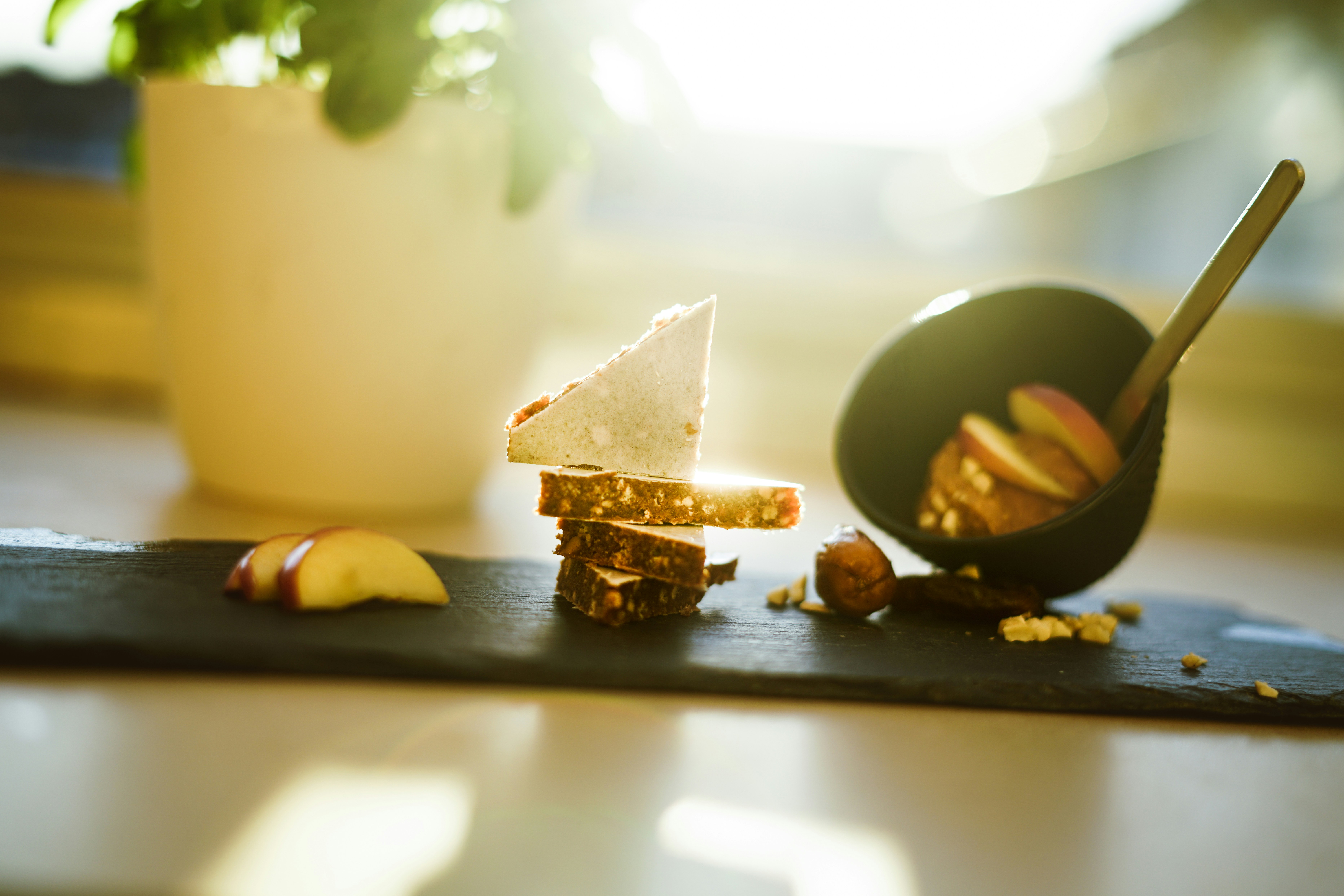 brown and white chocolate bar on black wooden table