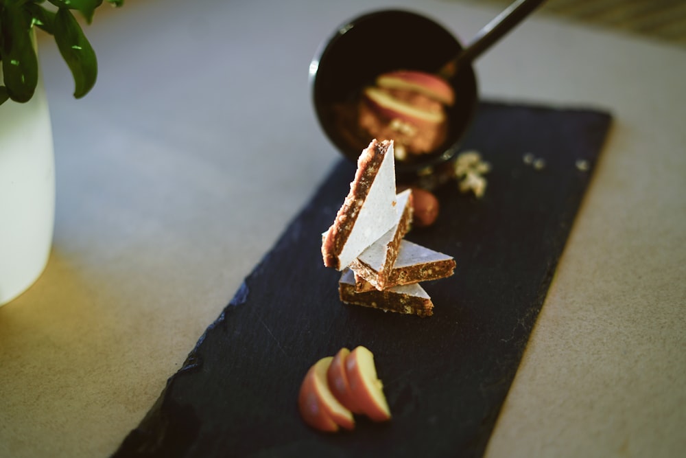 person holding white and brown chocolate bar