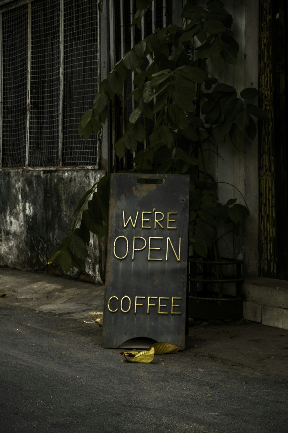 blue and yellow wooden signage