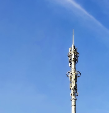 gray and black tower under blue sky