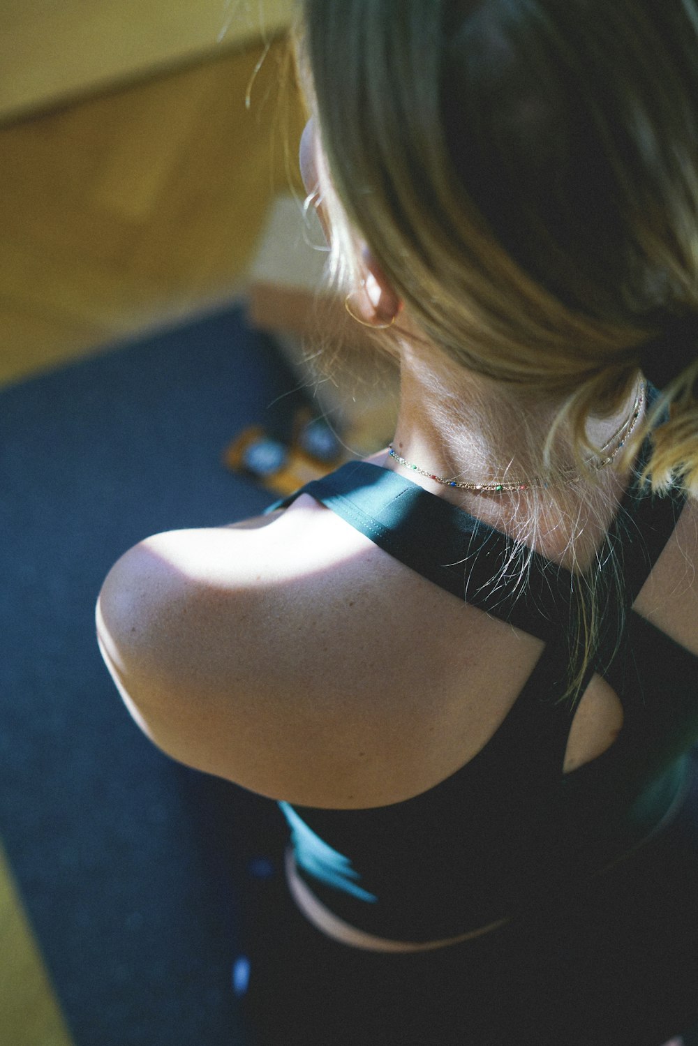 woman in black tank top