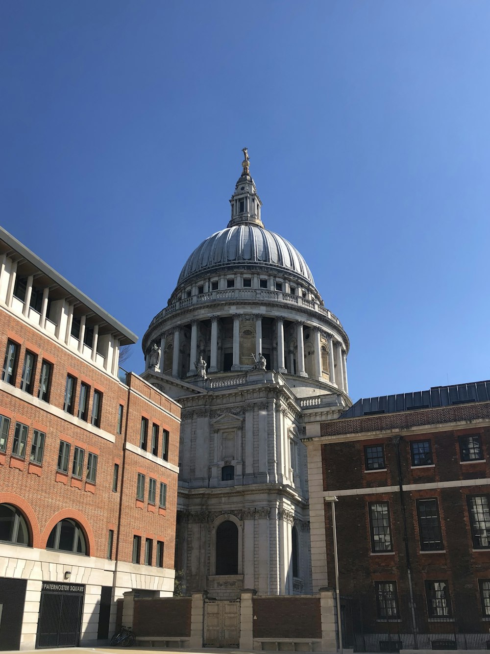 brown concrete building under blue sky during daytime