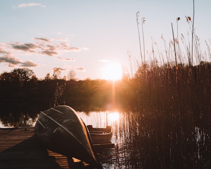 body of water during sunset